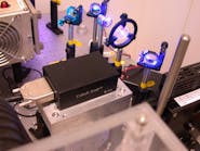 FIGURE 1. The 355-nm Cobolt Zouk laser in a total internal reflection fluorescence (TIRF) microscopy setup. Zouk is a single-mode DPSS laser offering 10 mW CW in a 5 &times; 2.8 &times; 1.8-in. hermetically sealed package, with very low-intensity noise, and in a high-quality TEM00-mode and low-divergent beam.