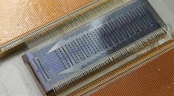 Photo of the quantum photonic chip that predicts the chemical properties of molecules.