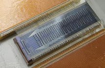 Photo of the quantum photonic chip that predicts the chemical properties of molecules.