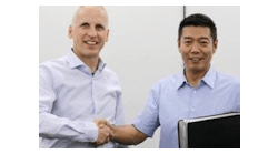 Dietmar Ley, CEO, Basler AG (left); Guan Qunli, chairman of Sanbao Xingye (right).